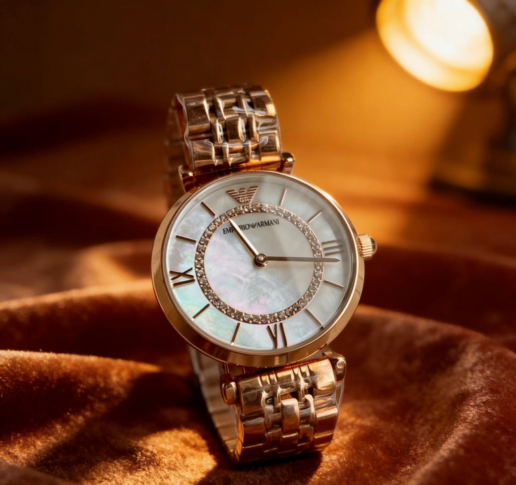 Emporio Armani AR1909 Mother of Pearl Dial Crystal Inner Bezel Roman Numeral Rose Gold Bracelet Ladies Watch