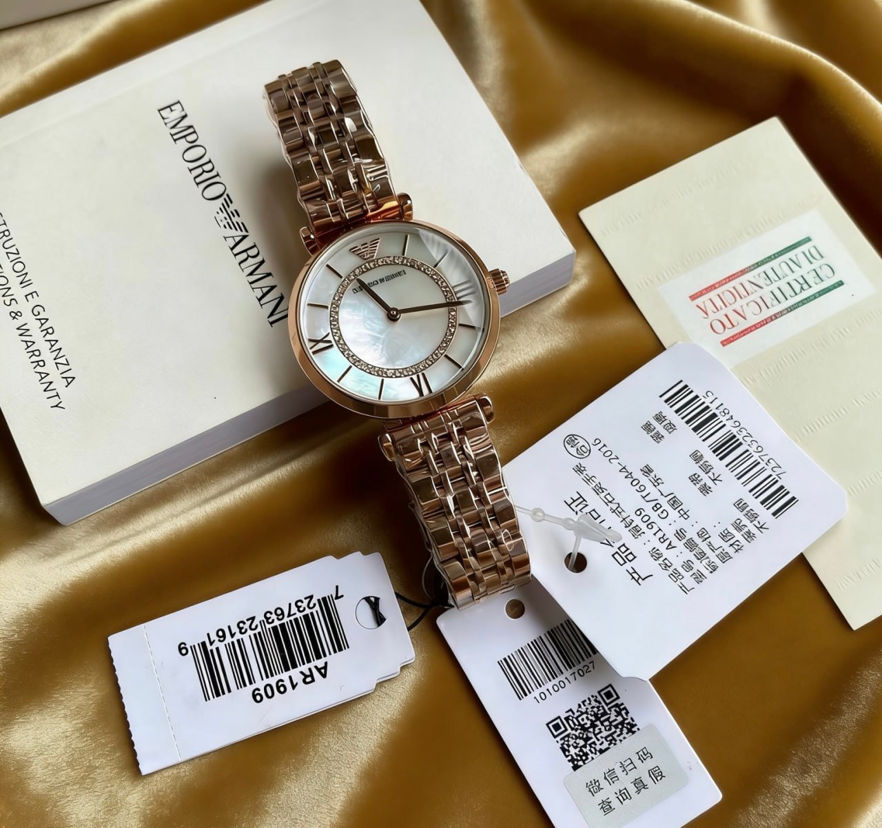 Emporio Armani AR1909 Mother of Pearl Dial Crystal Inner Bezel Roman Numeral Rose Gold Bracelet Ladies Watch