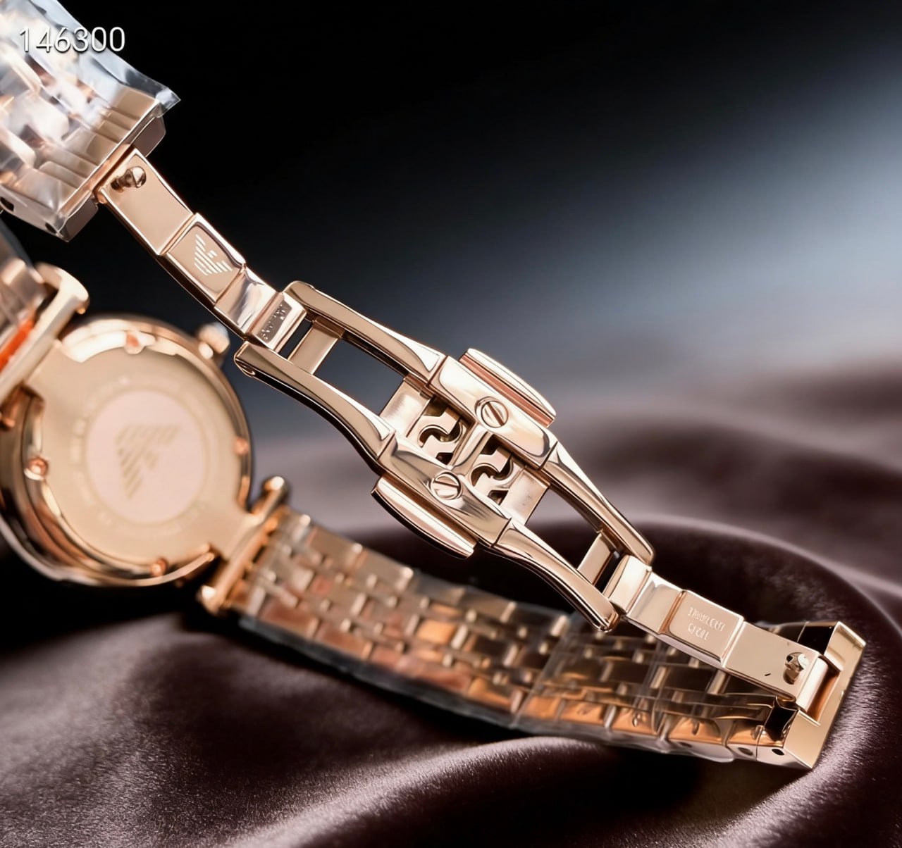 Emporio Armani AR1909 Mother of Pearl Dial Crystal Inner Bezel Roman Numeral Rose Gold Bracelet Ladies Watch
