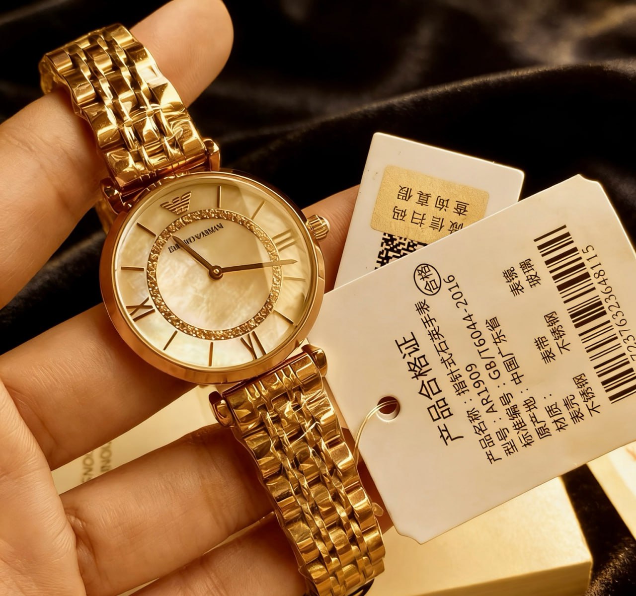 Emporio Armani AR1909 Mother of Pearl Dial Crystal Inner Bezel Roman Numeral Rose Gold Bracelet Ladies Watch